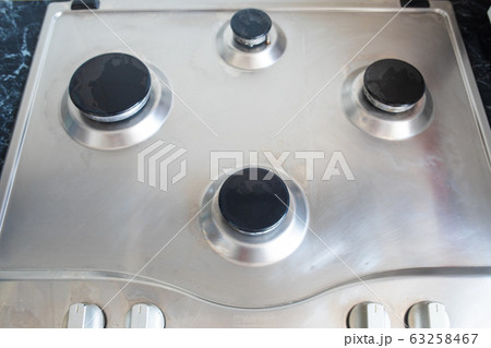 Polished gas cooker after washing.Perfectly clean 63258467