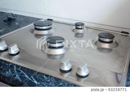 Polished gas cooker after washing.Perfectly clean 63258771