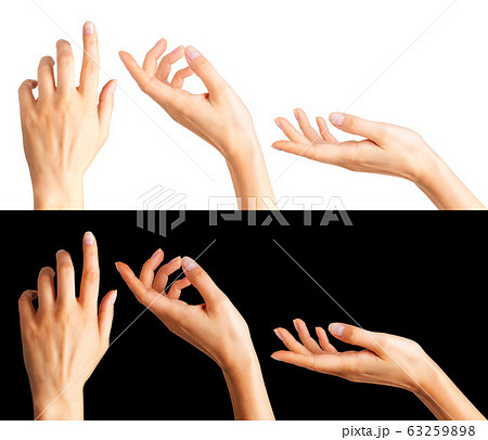 Woman hands with the index finger pointing up 63259898