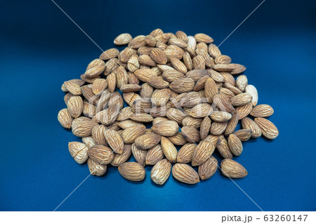 Almond texture closeup. Almond photo background. Organic food