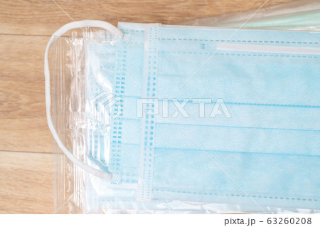 Surgical mask with rubber ear straps. Typical Surgical mask with rubber ear straps. Typical 63260208