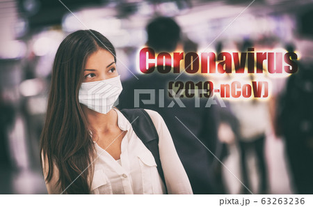 Coronavirus corona virus mask Asian chinese woman wearing flu mask prevention of Wuhan 2019-nCoV in China. Crowds public transport travel people 63263236
