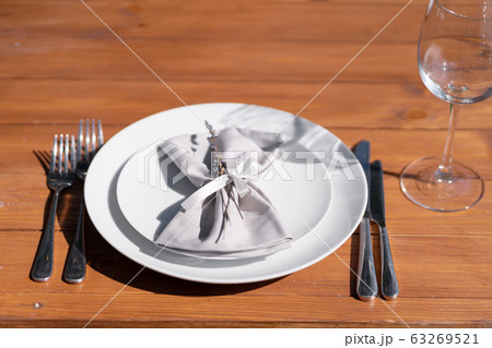 Beautifully served wooden table without a Beautifully served wooden table without a 63269521