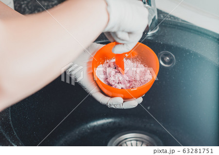 Alginate impression, orthodontist prepares a pink Alginate impression, orthodontist prepares a pink 63281751