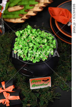 Cauldron corn. Halloween treat Cauldron corn. Halloween treat 63284896