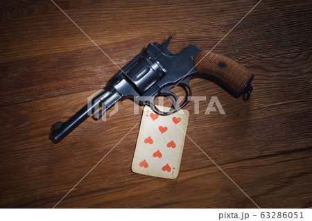 russian roulette - Eight of Hearts plaing card and 63286051
