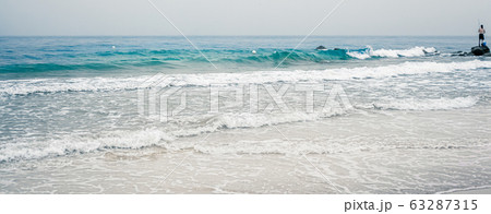 Beautiful sea or ocean horizon, coast view from tropical sand beach, summer vacation travel and holiday destination Beautiful sea or ocean horizon, coast view from tropical sand beach, summer vacation travel and holiday destination 63287315