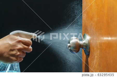 Cleaning door knob with alcohol spray for Cleaning door knob with alcohol spray for 63295435