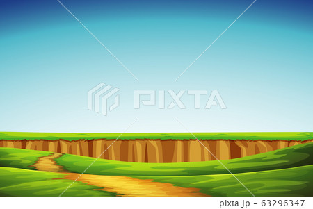 Background scene with green field and blue sky 63296347