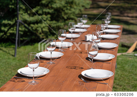 Served wooden table without a tablecloth. Cafe in Served wooden table without a tablecloth. Cafe in 63300206