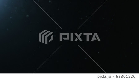 natural dust particles float in air on black background 63301526