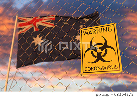 Coronavirus warning sign on the fence on the Australian flag background. Restricted entry or quarantine in Australia. Conceptual 3D rendering Coronavirus warning sign on the fence on the Australian flag background. Restricted entry or quarantine in Australia. Conceptual 3D rendering 63304275