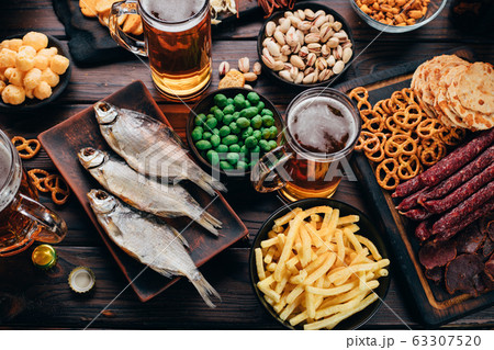Set of appetizers, salty snacks and light beer Set of appetizers, salty snacks and light beer 63307520