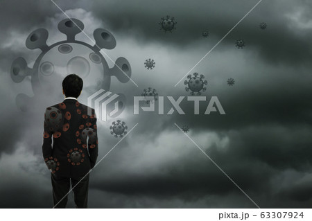Businessman standing wtih storm cloudy background, Businessman standing wtih storm cloudy background, 63307924
