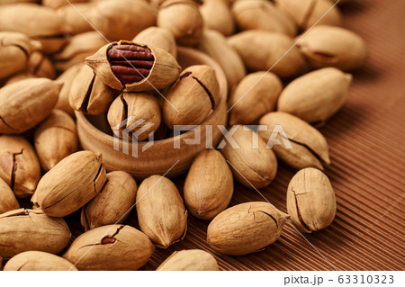 fresh pecan nut close-up 63310323