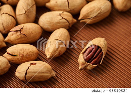 fresh pecan nut close-up 63310324