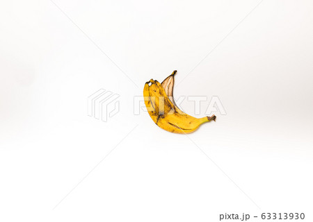 spoiled banana peel on an isolated white background 63313930