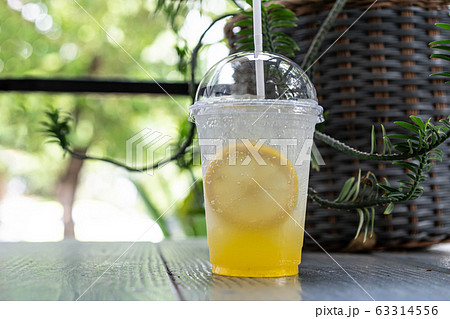 Iced lemonade soda with Yuzu orange 63314556