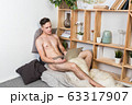 Naked sexy guy works at home with laptop 63317907