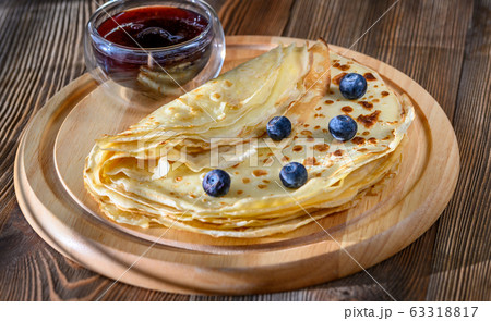 Crepes with fresh blueberries 63318817