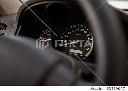 Close up shot of a speedometer in a car Close up shot of a speedometer in a car 63319007