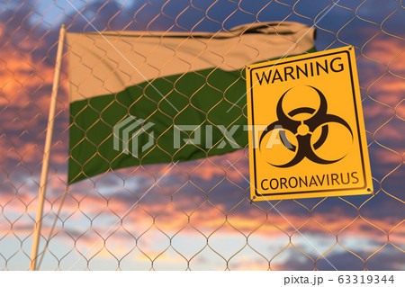 Biohazard coronavirus sign against flying flag of Saxony, a state of Germany. Quarantine related 3D rendering 63319344