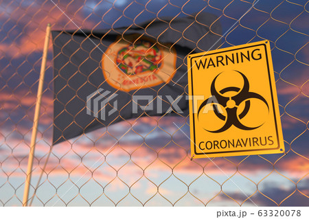 Biohazard coronavirus sign against flying flag of Minnesota. Quarantine related 3D rendering Biohazard coronavirus sign against flying flag of Minnesota. Quarantine related 3D rendering 63320078