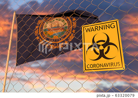 Coronavirus warning sign on the fence against flag of New Hampshire. Quarantine related 3D rendering Coronavirus warning sign on the fence against flag of New Hampshire. Quarantine related 3D rendering 63320079