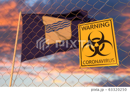 Coronavirus warning sign on the fence against waving flag of Basilicata, a region of Italy. Quarantine related 3D rendering 63320250