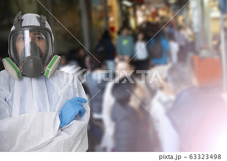 Female worker wearing protection suit and gas Female worker wearing protection suit and gas 63323498