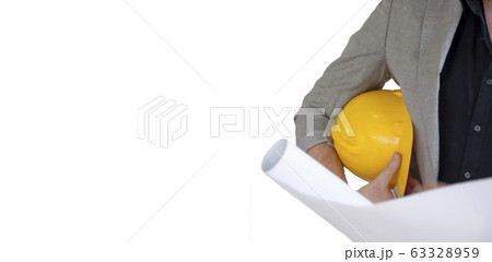 Architecture hold yellow helmet. 63328959