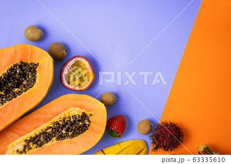 Exotic fruits on colored background Exotic fruits on colored background 63335610