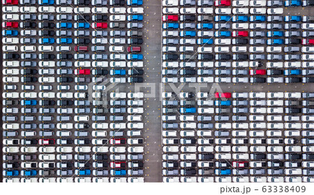 Aerial view new cars parking for sale stock lot 63338409