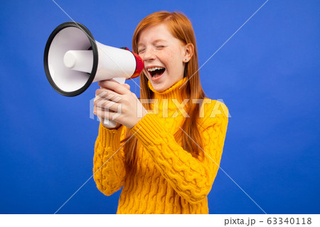 Red Haired Teenage Girl Screaming With Closed の写真素材