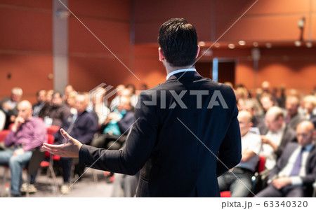 Speaker giving a talk at business conference meeting. Speaker giving a talk at business conference meeting. 63340320