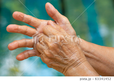 Senior woman's hands washing her hands using soap foam in step 6 on bokeh blue swimming pool Close up shot, Select focus, Prevention from covid19, Coronavirus, Bacteria, Healthcare, 7 step wash hand Senior woman's hands washing her hands using soap foam in step 6 on bokeh blue swimming pool Close up shot, Select focus, Prevention from covid19, Coronavirus, Bacteria, Healthcare, 7 step wash hand 63341452