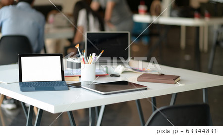 Cropped shot of Tablet, laptop and stationary Cropped shot of Tablet, laptop and stationary 63344831