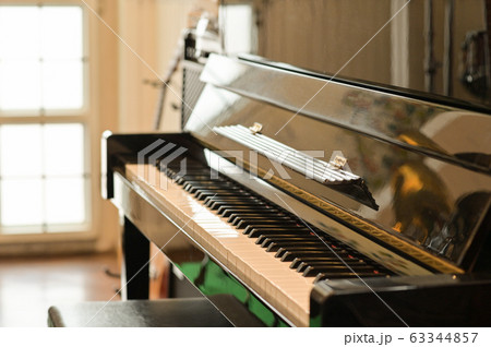 Cropped shot of Classical piano in a room with 63344857