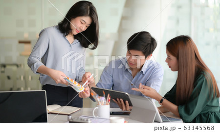 Cropped shot of young designer team working on Cropped shot of young designer team working on 63345568