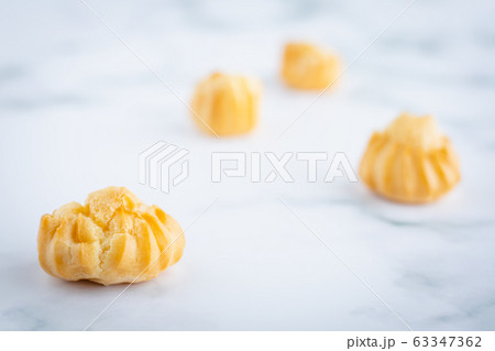 Delicious eclair vanilla cream, choux dough filled with a cream, homemade bakery Delicious eclair vanilla cream, choux dough filled with a cream, homemade bakery 63347362