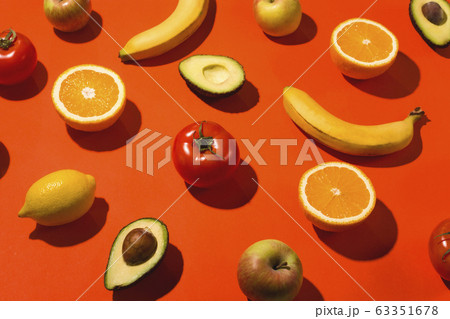 Beautiful fruits and vegetables on a bright Beautiful fruits and vegetables on a bright 63351678