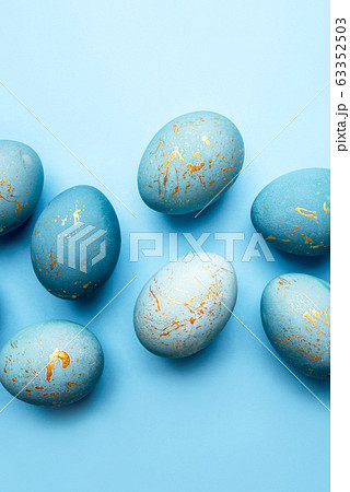Easter background of eggs painted in blue color. Easter background of eggs painted in blue color. 63352503