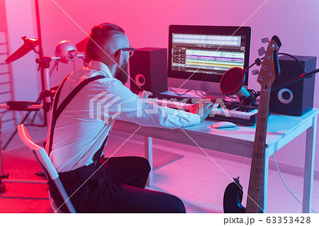 Professional musician recording synthesizer in digital studio at home, Music production technology concept. 63353428