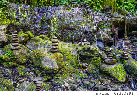 View on stone tower on mountain river on Bali, View on stone tower on mountain river on Bali, 63353892