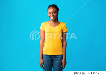 Black Girl In Braces Standing Smiling To Camera, Studio Shot 63354755