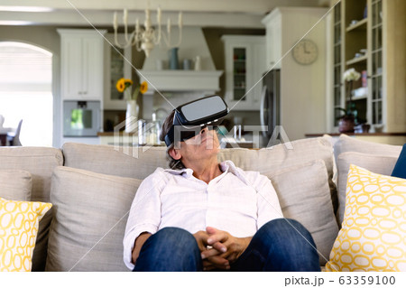 Man spending time at home Man spending time at home 63359100