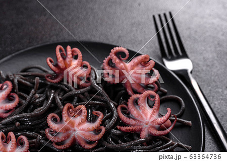 Black seafood pasta with shrimp and octopus Black seafood pasta with shrimp and octopus 63364736