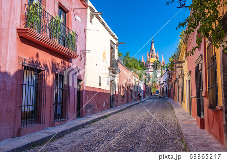 Colorful street of San Miguel de Allende, colonial town in Mexico. UNESCO World Heritage Site. Colorful street of San Miguel de Allende, colonial town in Mexico. UNESCO World Heritage Site. 63365247