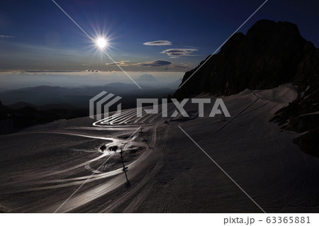 Glacier with rocks in Austria with snow and blue sky 63365881