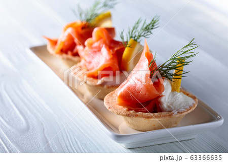 Tartlets with salmon. Tartlets with salmon. 63366635